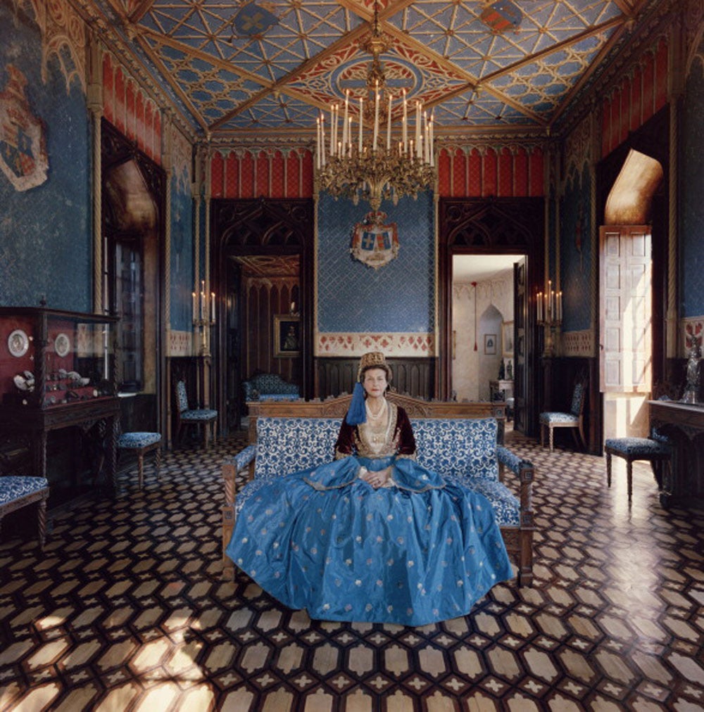 Madame Jean Serpieri sits in the ballroom of the Tour La Reine near Athens, wearing a gown which belonged to the wife of Otto, the first king of modern Greece, December 1961. The palace too originally belonged to King Otto, and was used as a summer