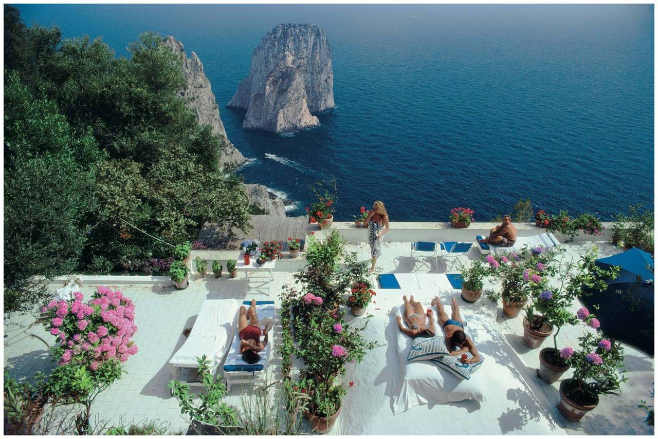 Slim Aarons Landscape Photograph - Sunbathers at Il Canille, Capri, Italy (La Dolce Vita), Aarons Estate Edition
