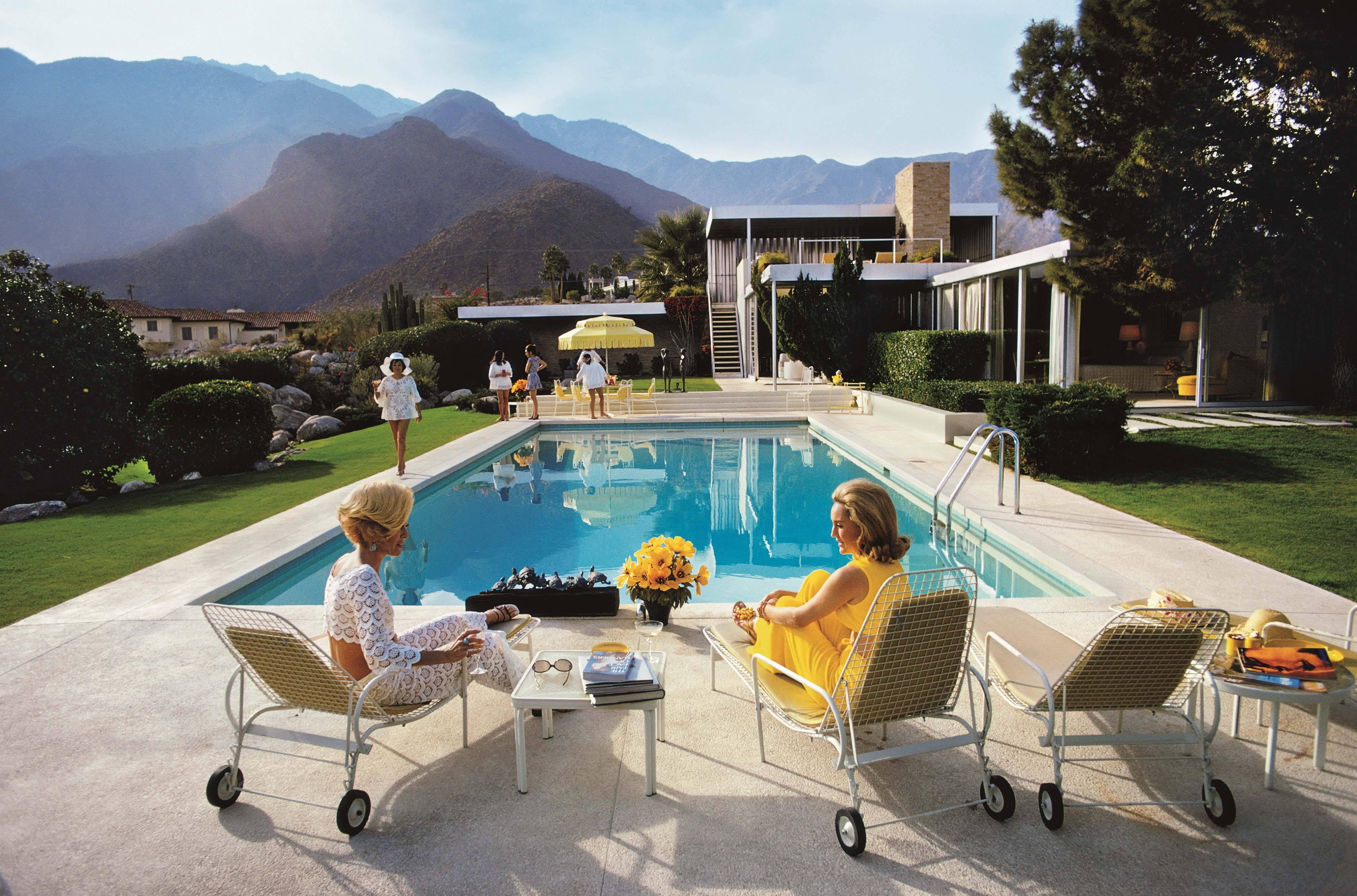 A desert house in Palm Springs designed by Richard Neutra for Edgar Kaufman. Lita Baron approaches Nelda Linsk, right, wife of art dealer Joseph Linsk who is talking to a friend, Helen Dzo Dzo.  

48 x 72 inches
$7930

40 x 60 inches
$7020

30 x 40