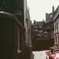 „Sports Car Couple“, Slim Aarons Estate Edition, Fotografie im Mid-Century-Modern-Stil
