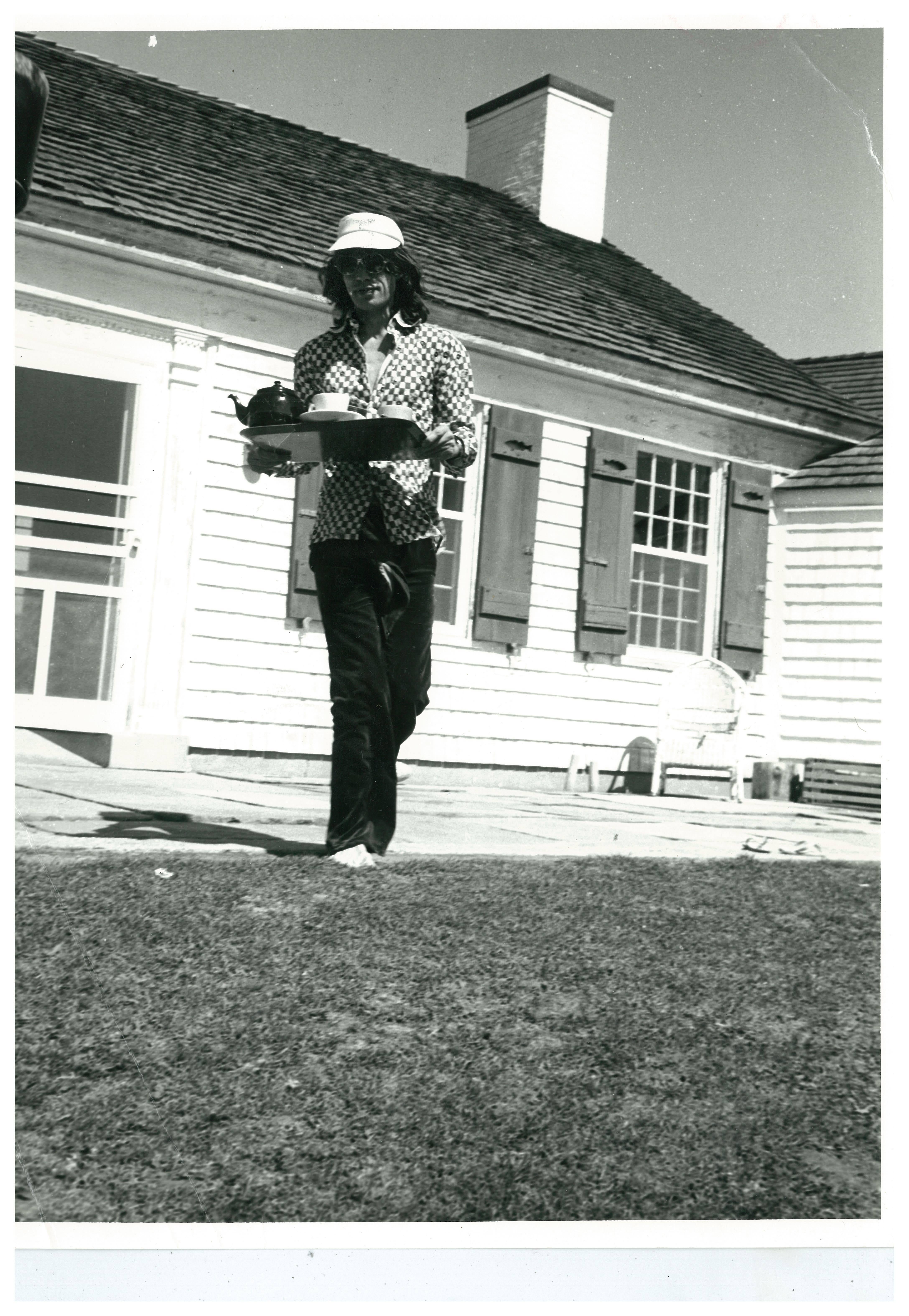 Andy Warhol Black and White Photograph - Mick Jagger Serving Tea at Warhol's Montauk Estate (UNIQUE)