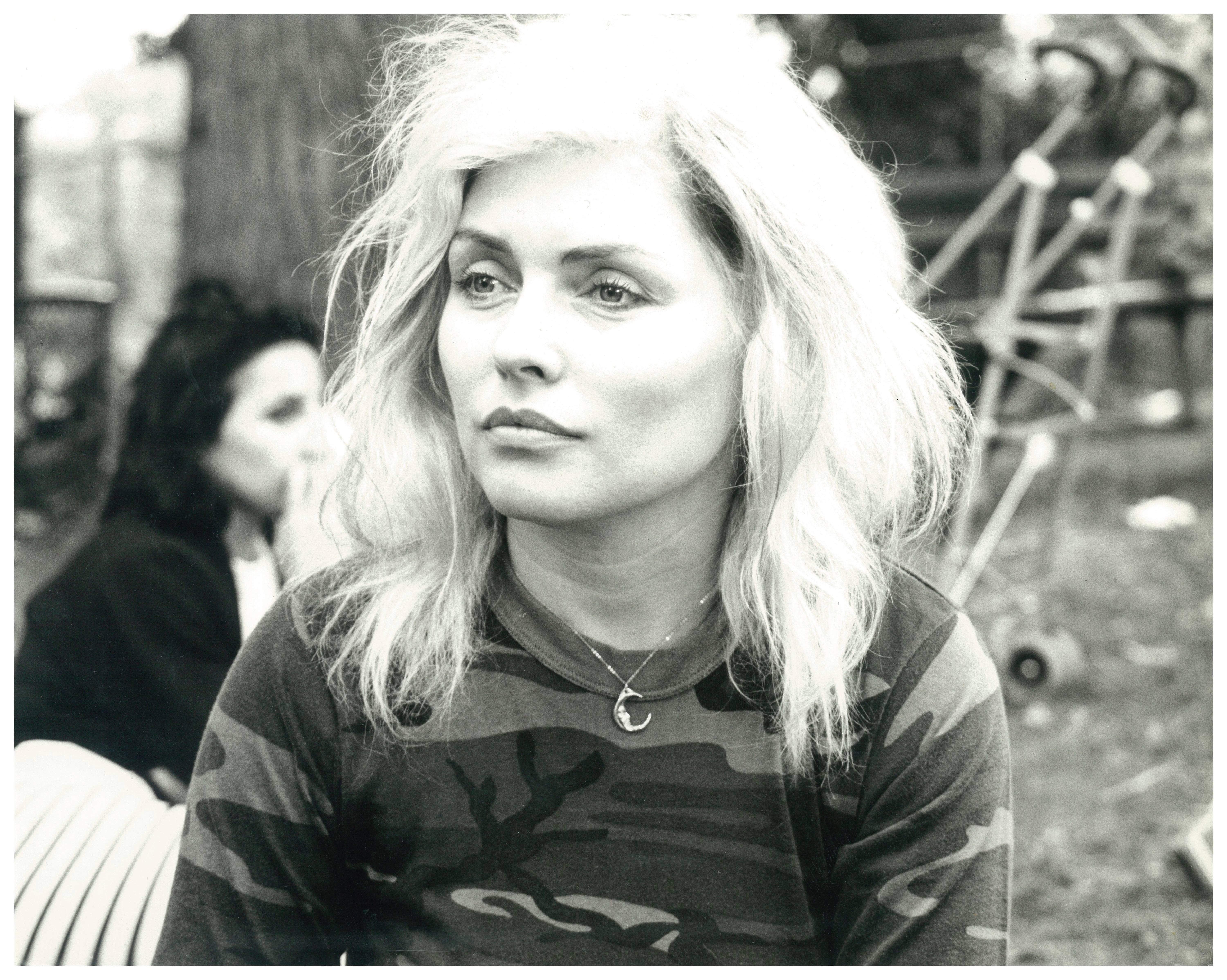 Andy Warhol Portrait Photograph - Debbie Harry in Tompkins Square Park wearing Stephen Sprouse Camo 