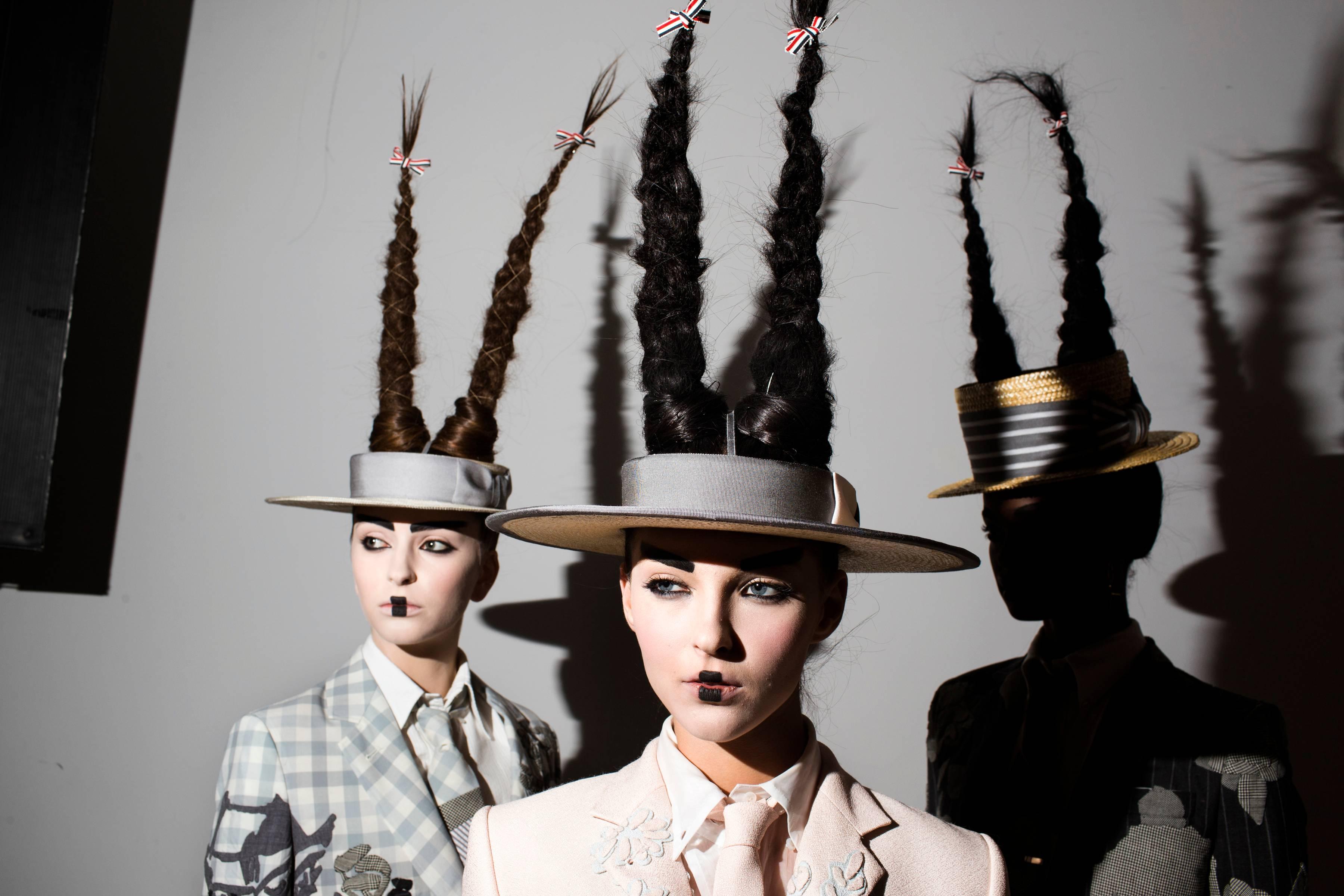 Landon Nordeman Figurative Photograph - "Thom Browne (Hats & Hair)" - Celebrity Fashion Photography - Winogrand