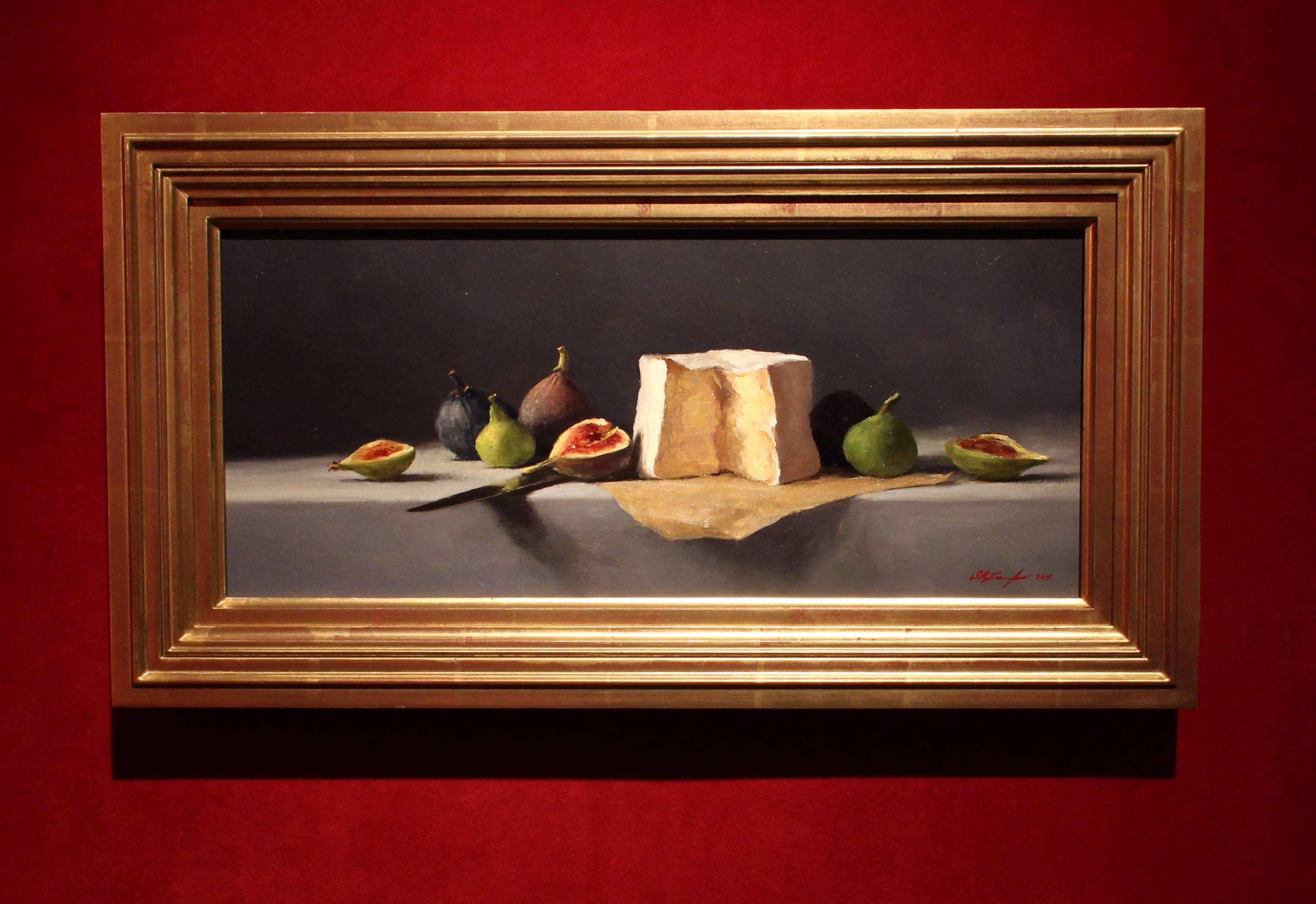 "L’Explorateur and Figs" is a sumptuous still life of figs and fromage featuring rich hues of blue gray, violet, navy, red & vibrant green. 

Sarah Lamb is a talented and dynamic realist painter. With classical skill—and through