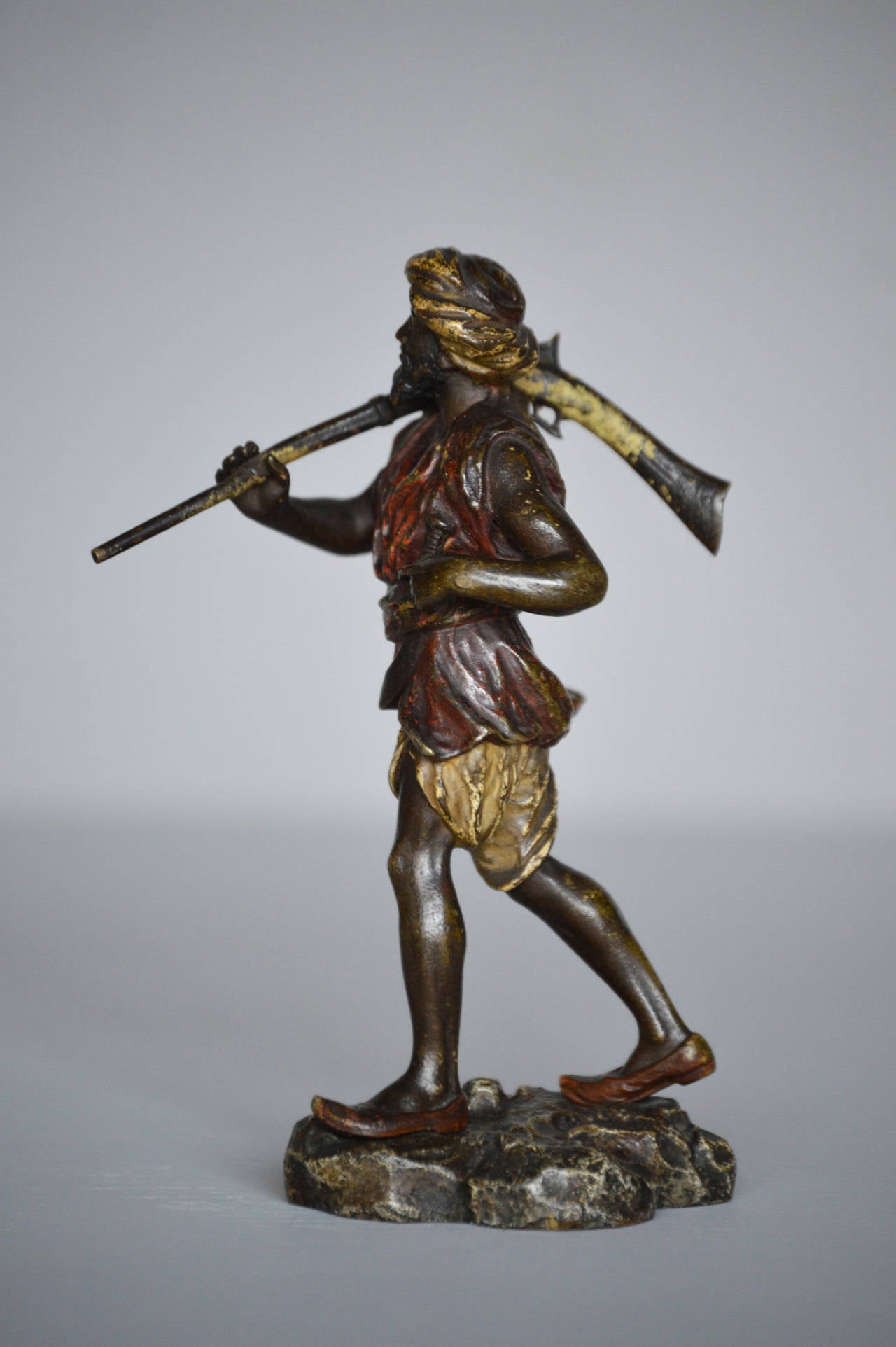 Franz Xavier Bergman
Austrian (1861-1936)
Bronze, signed & stamped
Height: 4¾ inches

An excellent quality late 19th century cold painted bronze sculpture of an Arab warrior with a rifle over his shoulder. The bronze has good hand finished