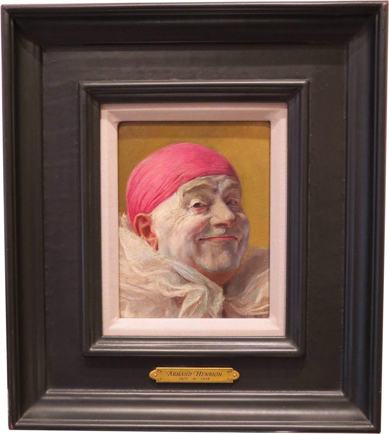 "Clown with Red Cap Smiling"