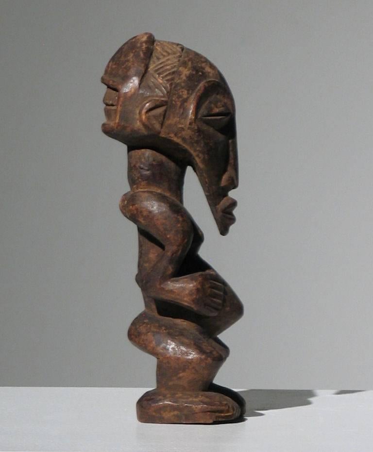 African Songye Figure - Brown Figurative Sculpture by Unknown