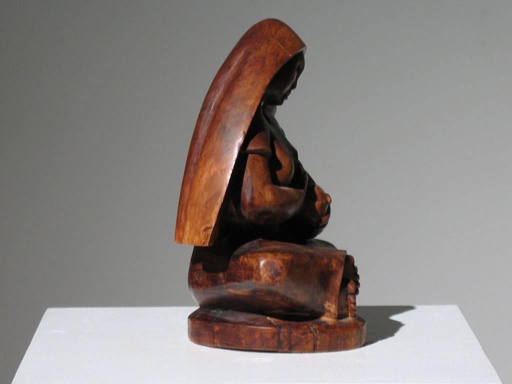 Mexican Modernist 
Madonna and Child
Wood Sculpture
11.75 x 9 x 6.5 inches

wear consistent with age