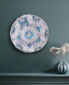 Accumulations #6, blue and white circular upcycled paper sculpture