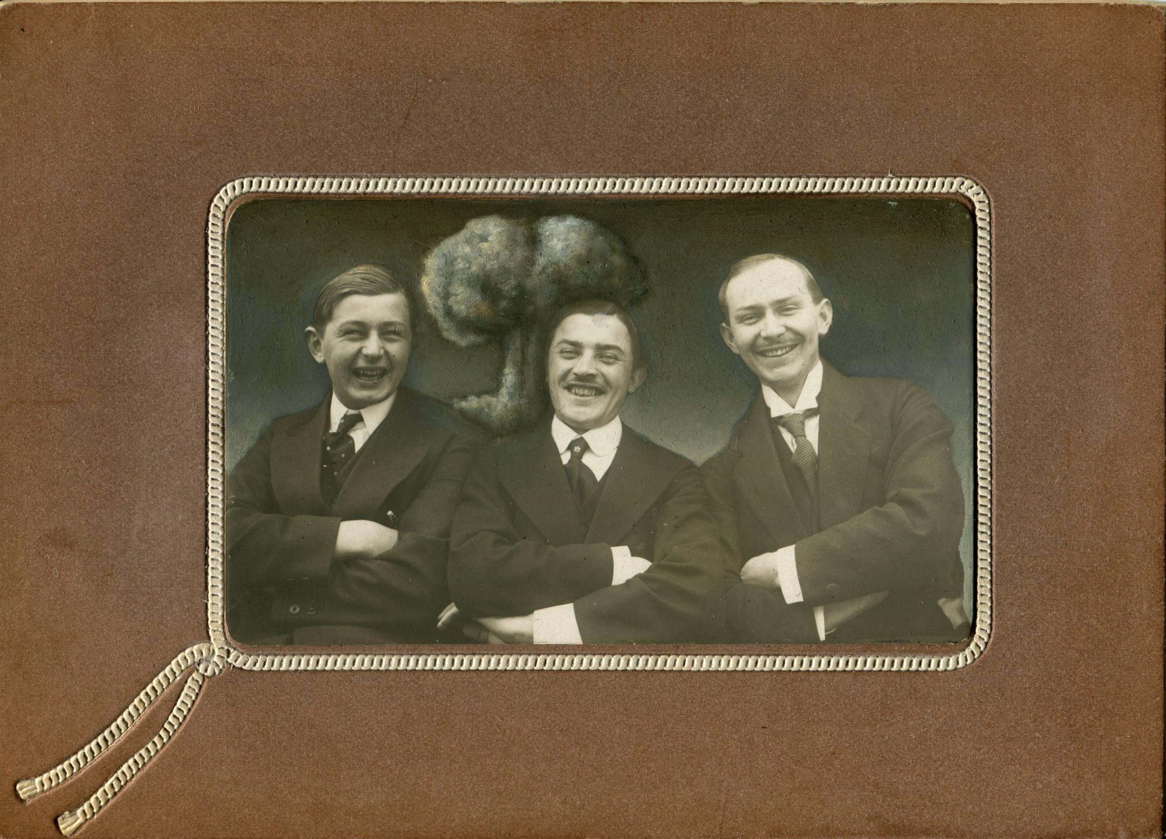 Jana Paleckova Black and White Photograph - Untitled, Portrait of Three Man Smiling with Mushroom Cloud 