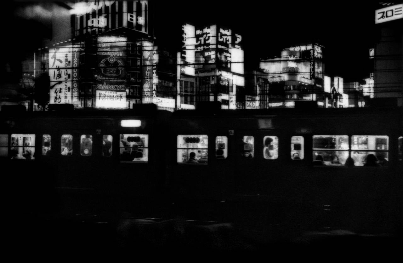 James Whitlow Delano Black and White Photograph - Chuo Line Train coming into Shinjuko Station, Tokyo, Japan