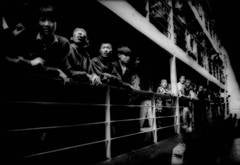 Peasants crowding the rail of a river steamer, Yangtze River, China.