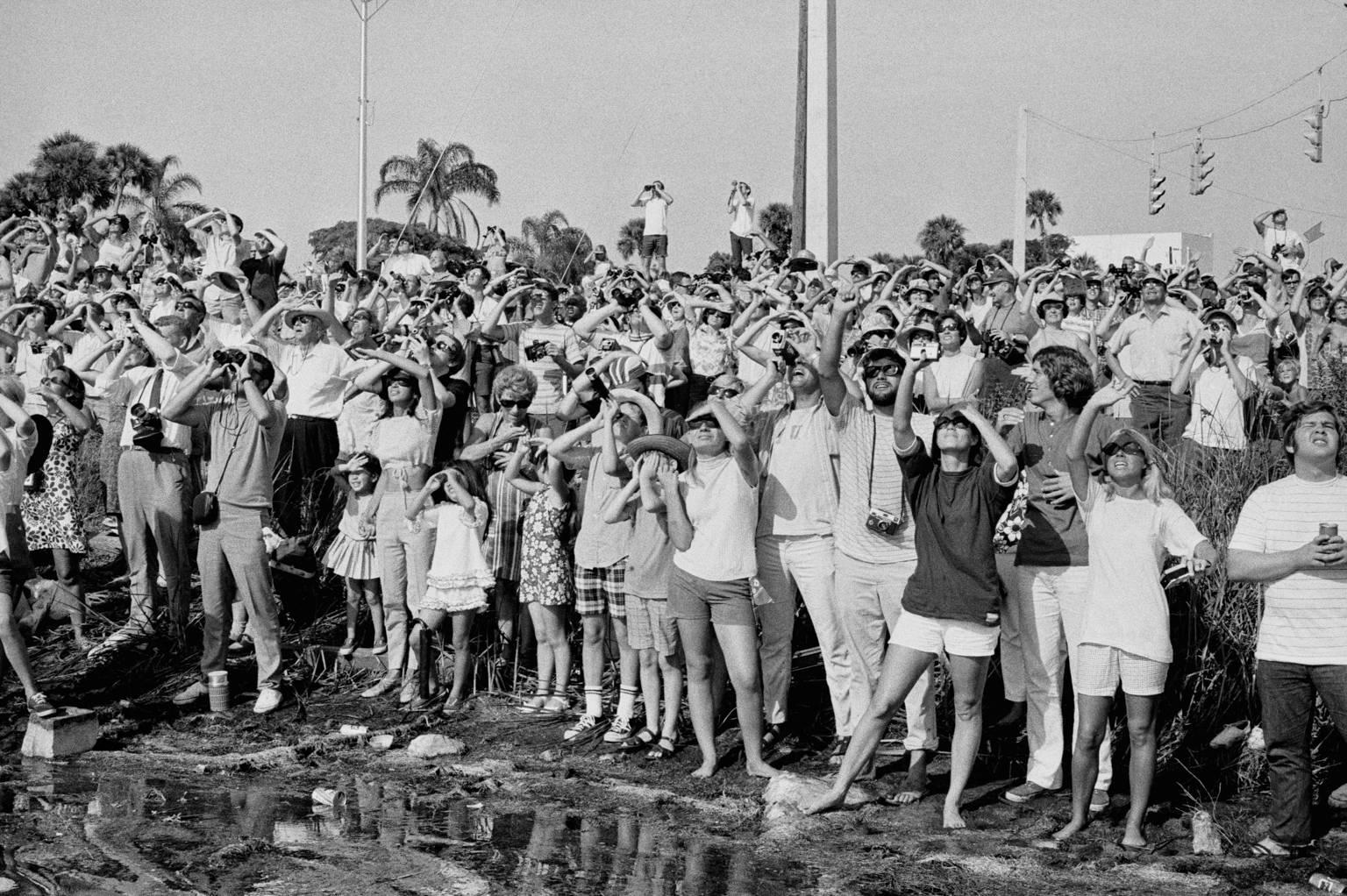Jean-Pierre Laffont Black and White Photograph - Apollo XI Launch Crowd watching and taking photos Cape Kennedy, FL. July 16th, 1