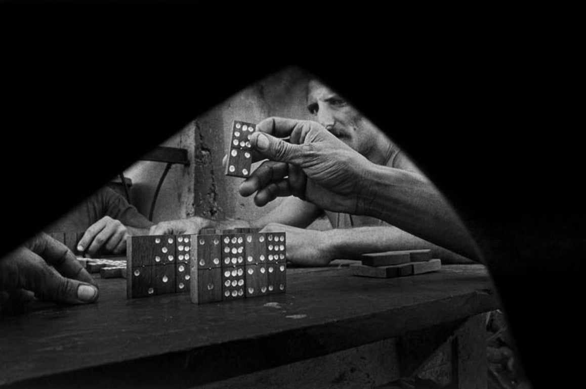 Ernesto Bazan Black and White Photograph - Playing dominoes, Havana