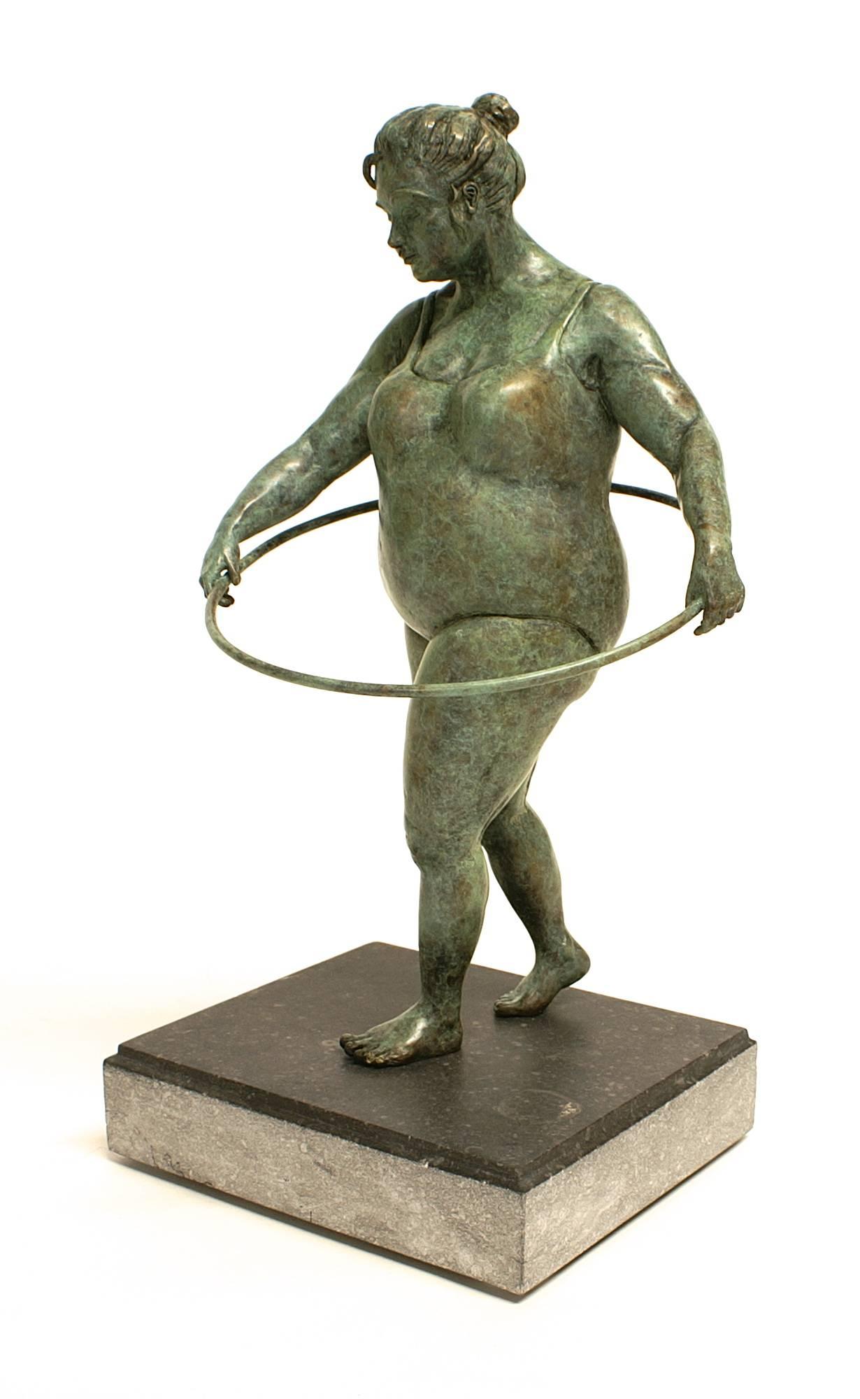 Veronique Clamot Figurative Sculpture - "Cinquieme Essai" Bronze rounded figure with a hula hoop in green patina