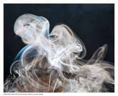 Embryonic Creature Exhaling Blue Smoke