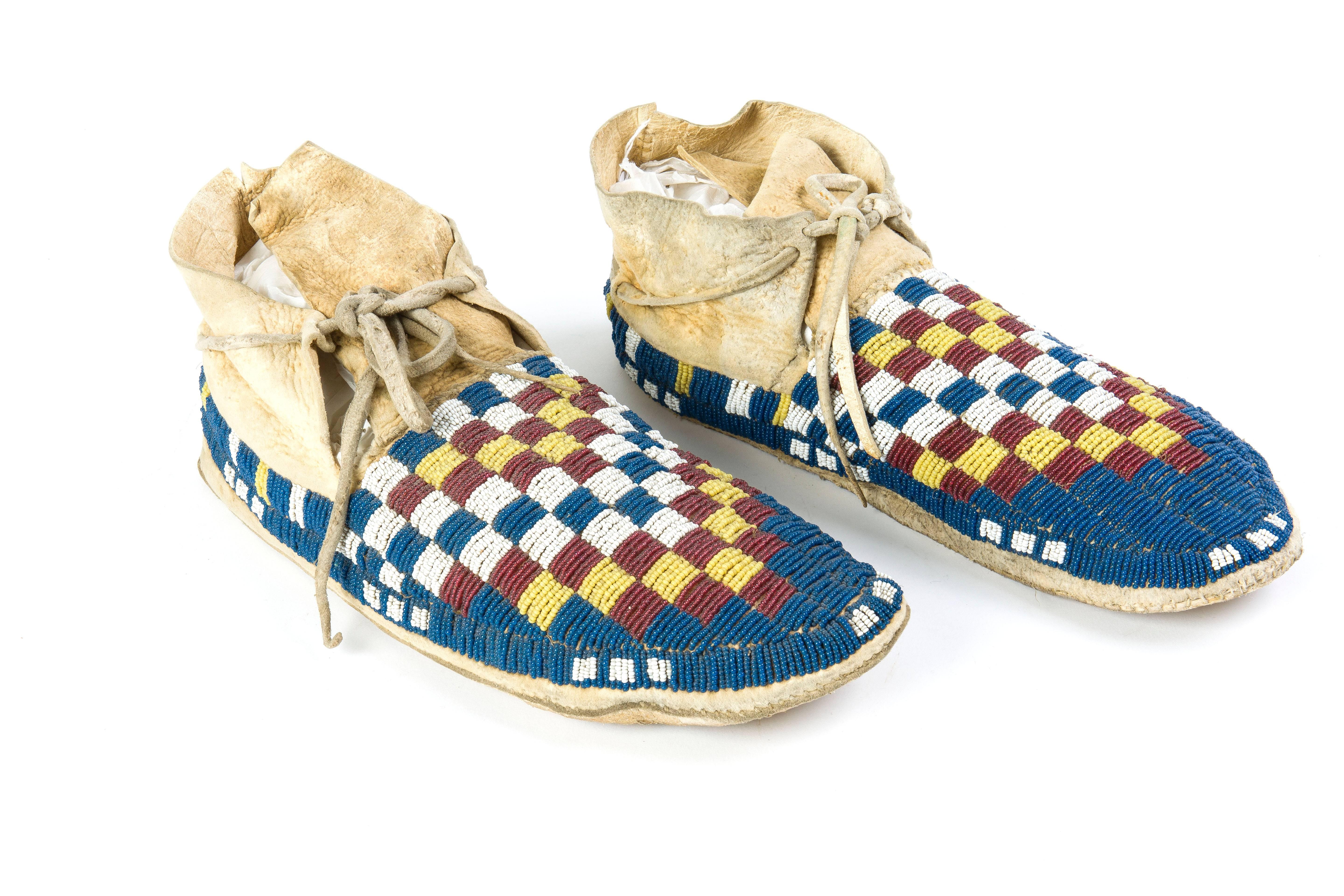 American Indian Art
Blackfoot beaded moccasins
Alberta, Canada, circa 1900
Skin, rawhide (soles), Murano beads, sinew
