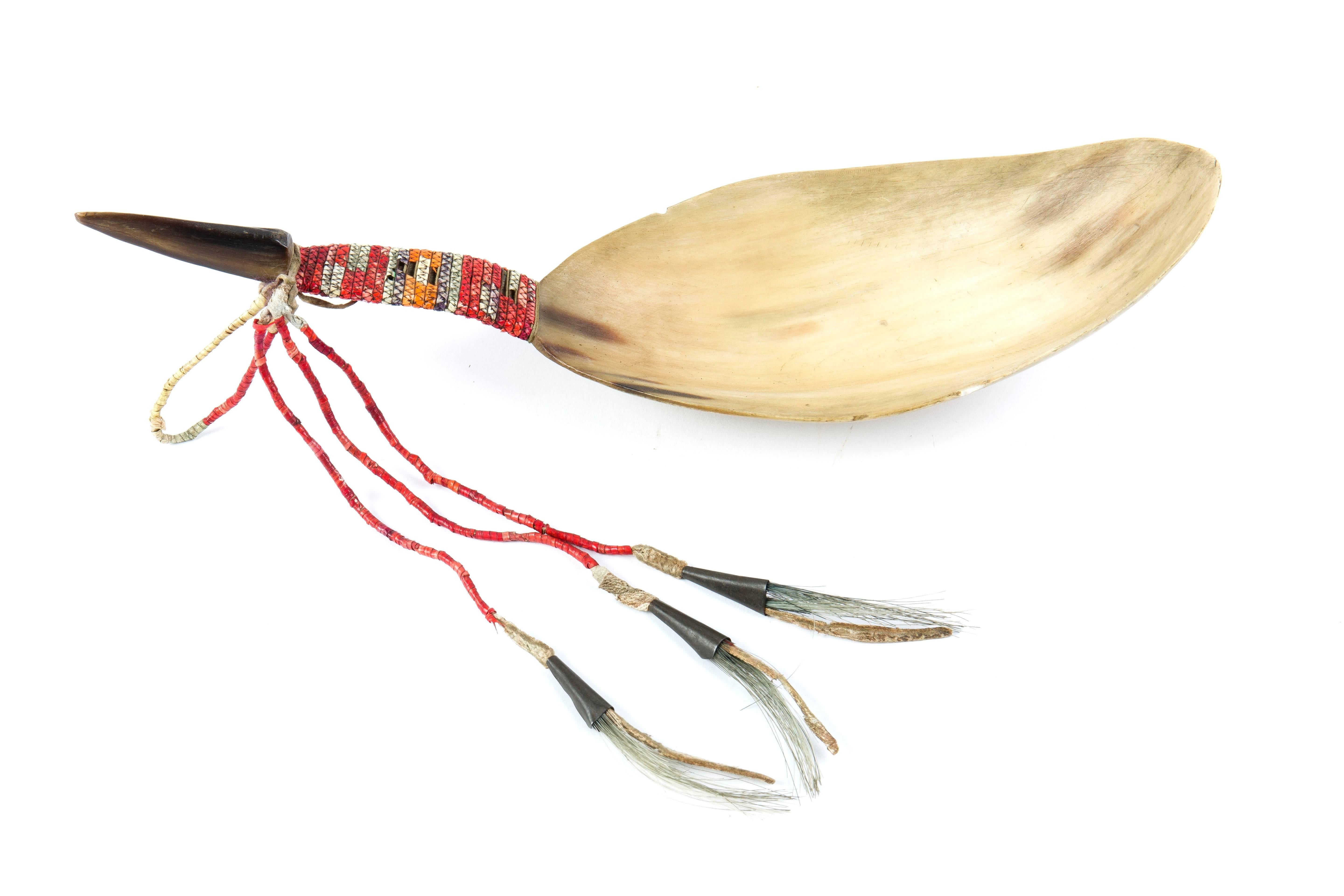 American Indian Art
Spoon Sioux
South Dakota, USA, circa 1890
Horn skin thongs, quill, metal cones, horsehair 