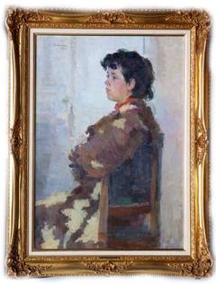 Portrait of a child sitting on a chair