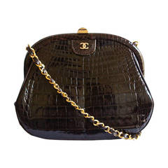 Vintage 1980's CHANEL brown convertible crocodile clutch with hidden gilt chain