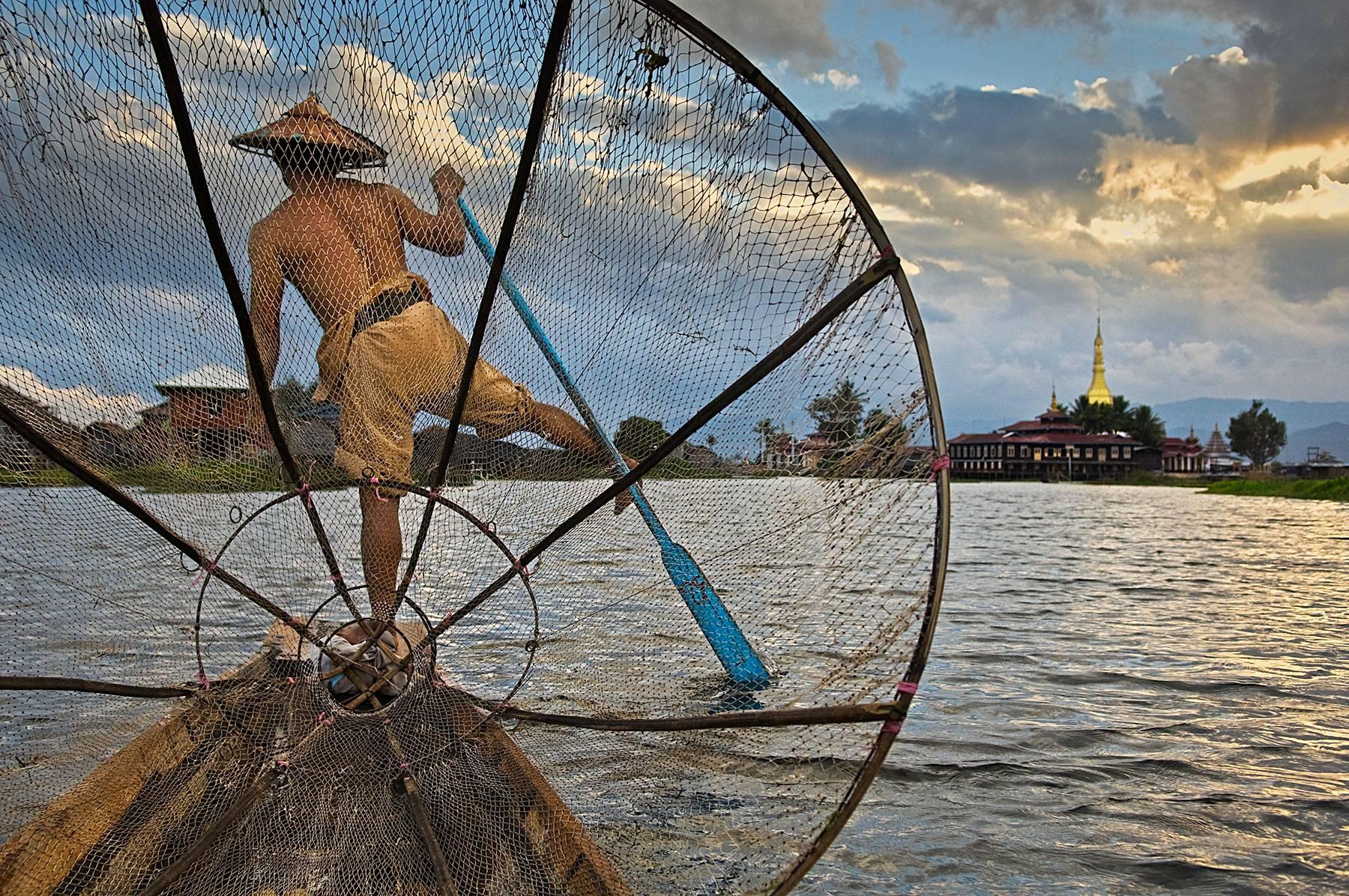 Steve McCurry Color Photograph - Fisherman on Inle Lake, Ed. of 15