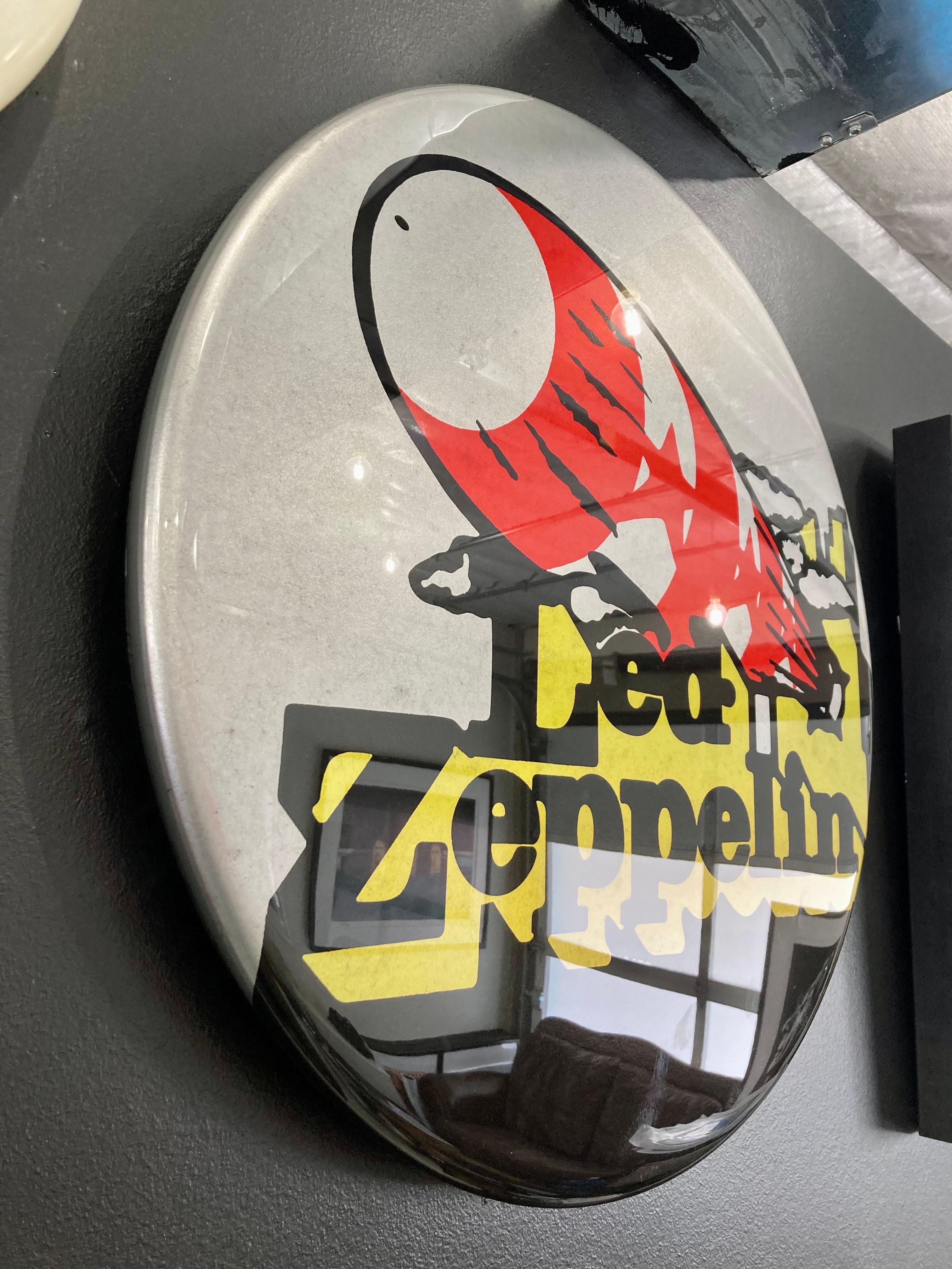 Led Zeppelin Giant Handmade Metallic 3D Vintage Button - Hand made giant 3D vintage button by British artist, Tony Dennis, AKA Tapedeck Art. 

Artwork printed onto vinyl and wrapped onto a hand spun aluminum button, hand finished, powder coated,