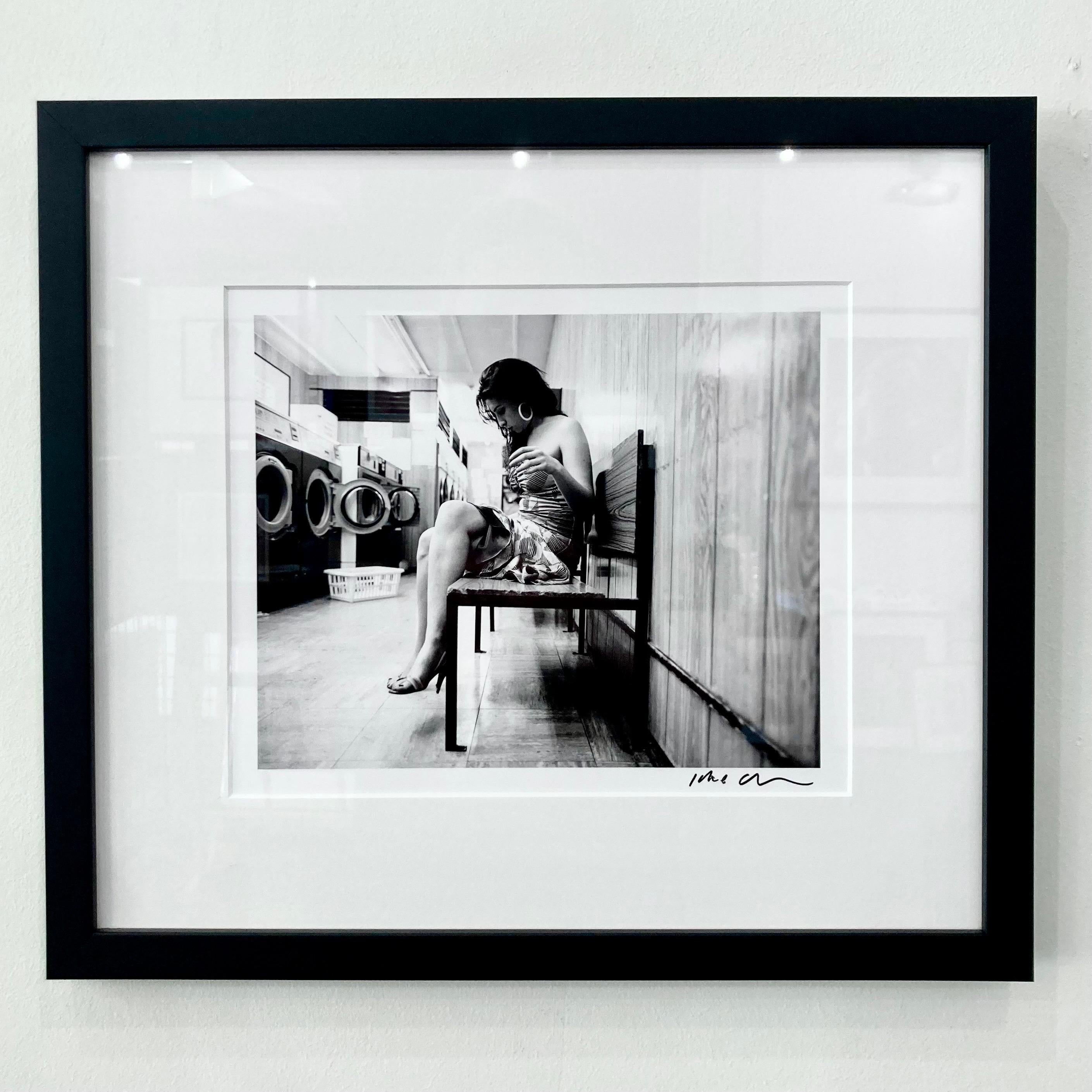 Amy Winehouse at the laundromat by Jake Chessum framed 9x12