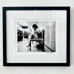 Amy Winehouse at the laundromat by Jake Chessum framed 9x12" print