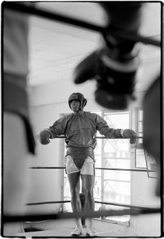 Muhammad Ali in training gear by Al Satterwhite