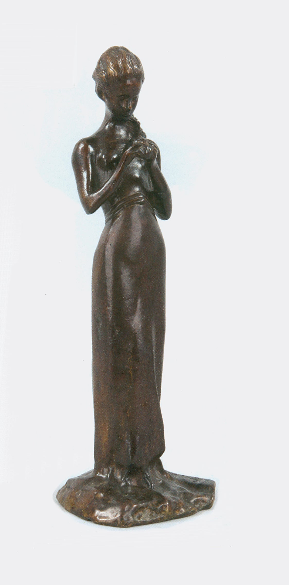 Prince Paul Troubetzkoy Figurative Sculpture - Bronze "A Girl Plaiting Her Hair" by Paolo Troubetzkoy