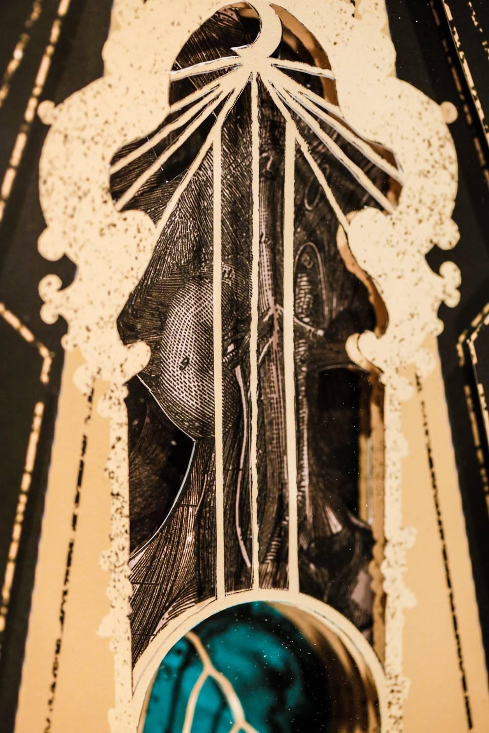 This is an original framed paper sculpture by Alex Eckman-Lawn measuring 11in x 9in.  The piece ships in the pictured black shadowbox frame.

Alex Eckman-Lawn creates 5-7 layer, hand-cut, paper collages using everything from his original digital