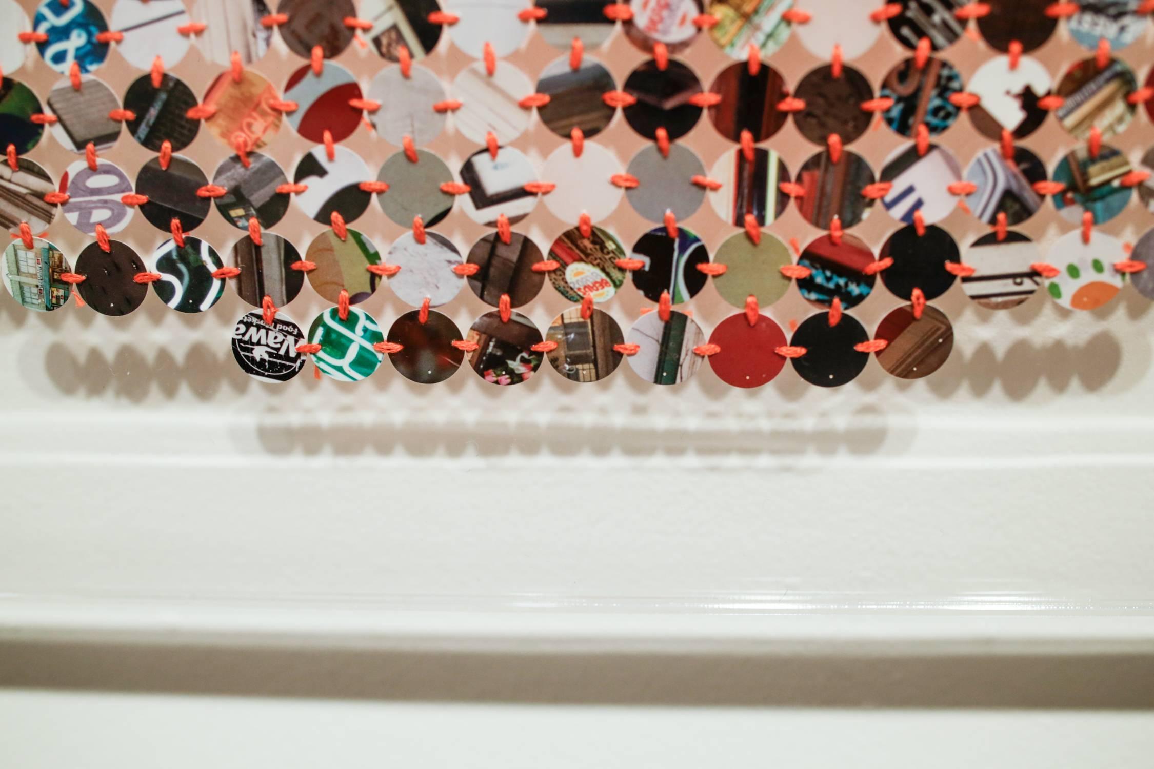"Philly, Then" is an original hand-stitched work made from punched photographs*, hand-stitched together with embroidery thread.  The work is shipped mounted in the pictured clear acrylic frame measuring 24in x 24in.  

Please note: Artwork