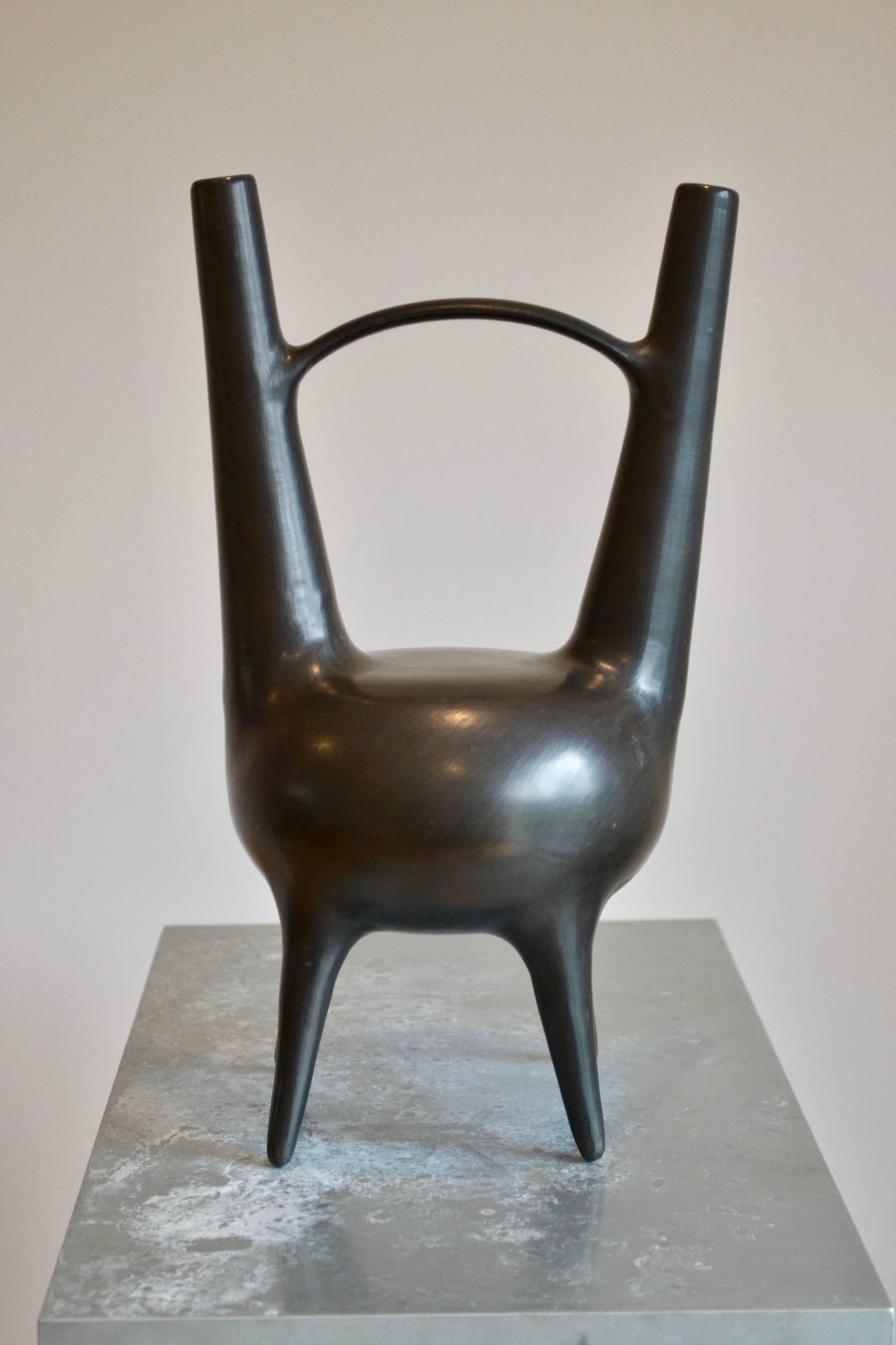 Bucchero Vase designed  by Gio Ponti and by the great Italian Artisan Carlo Alberto Rossi of the 40's.

The bucchero is a special clay, from the Etruscan times, was dried in open air and ,after baked in oven at very high temperature, which removes