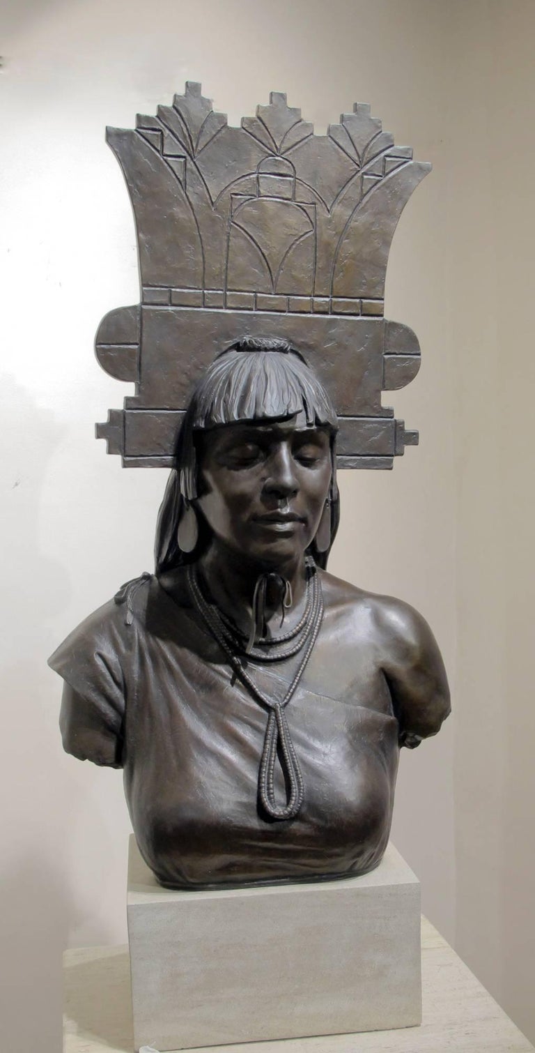 Tablita Paul Moore Pueblo Indian dancer, female headdress bronze limestone base 

Paul Moore was born in Oklahoma City a member of the (Creek) Muscogee Nation.  Moore has sculpted more than 110  commissions for numerous municipal, corporate,