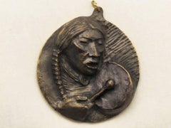 Plains Drummer medallion bronze by Allan Houser Apache