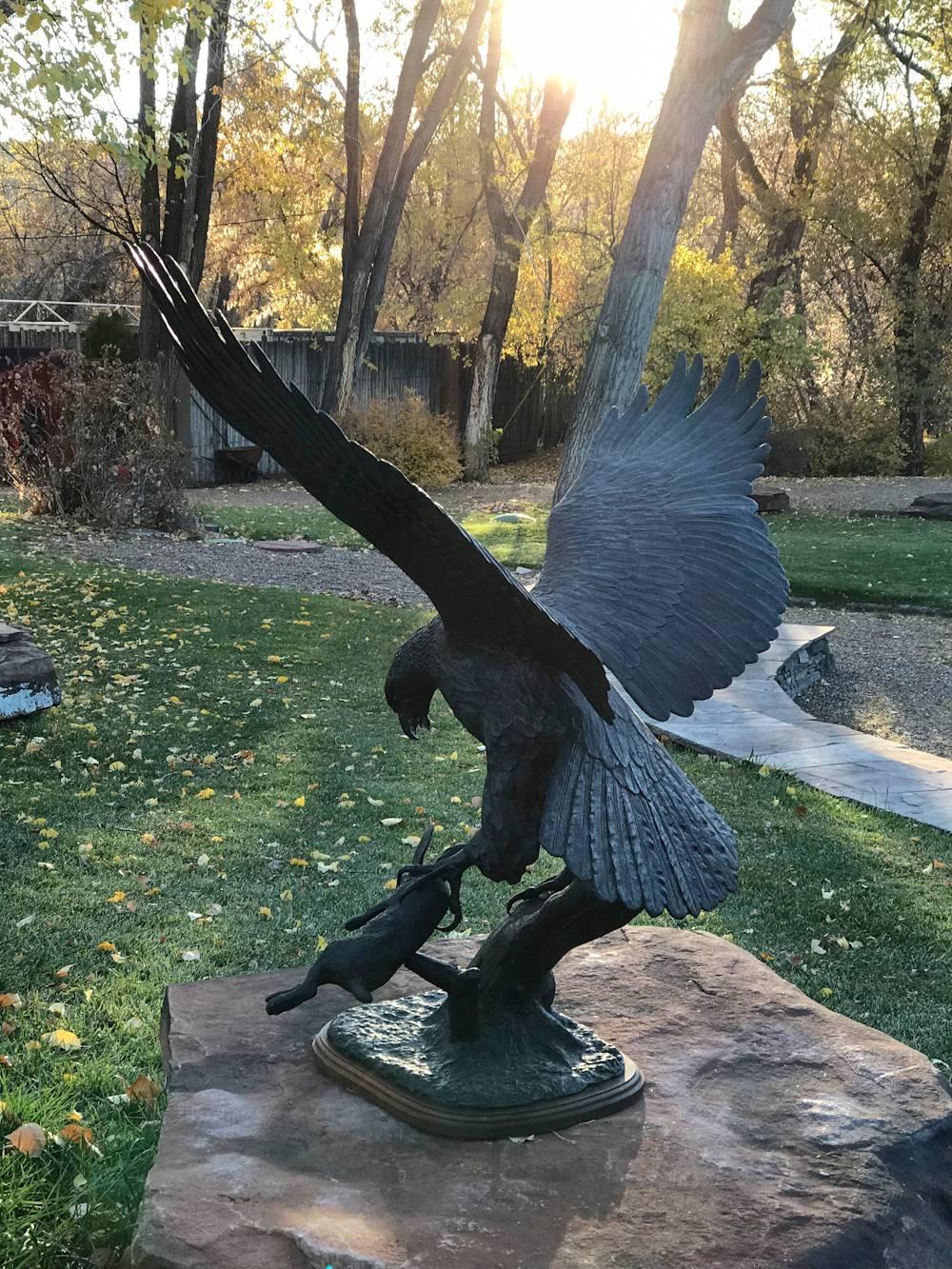 Hawk and Rabbit, wildlife scene bronze action sculpture hawk captures rabbit - Gold Figurative Sculpture by Juan Martinez