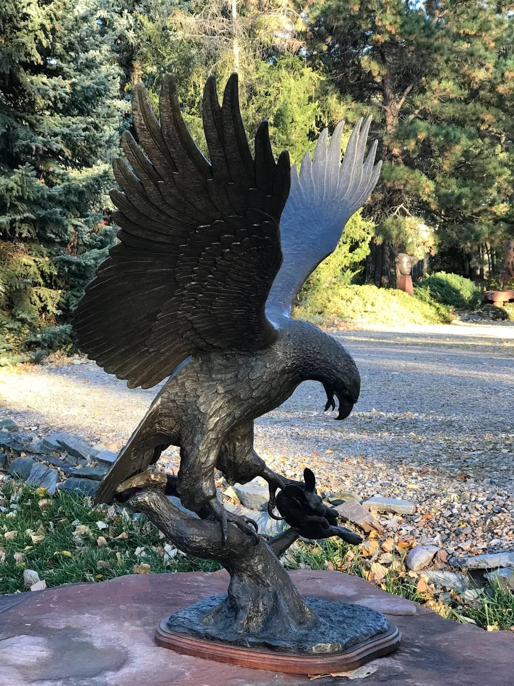 Hawk and Rabbit, wildlife scene bronze action sculpture hawk captures rabbit - Sculpture by Juan Martinez