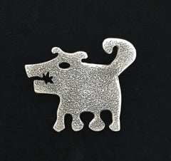 Sombra Girl, silver dog pendant on leather cord Navajo rez dog