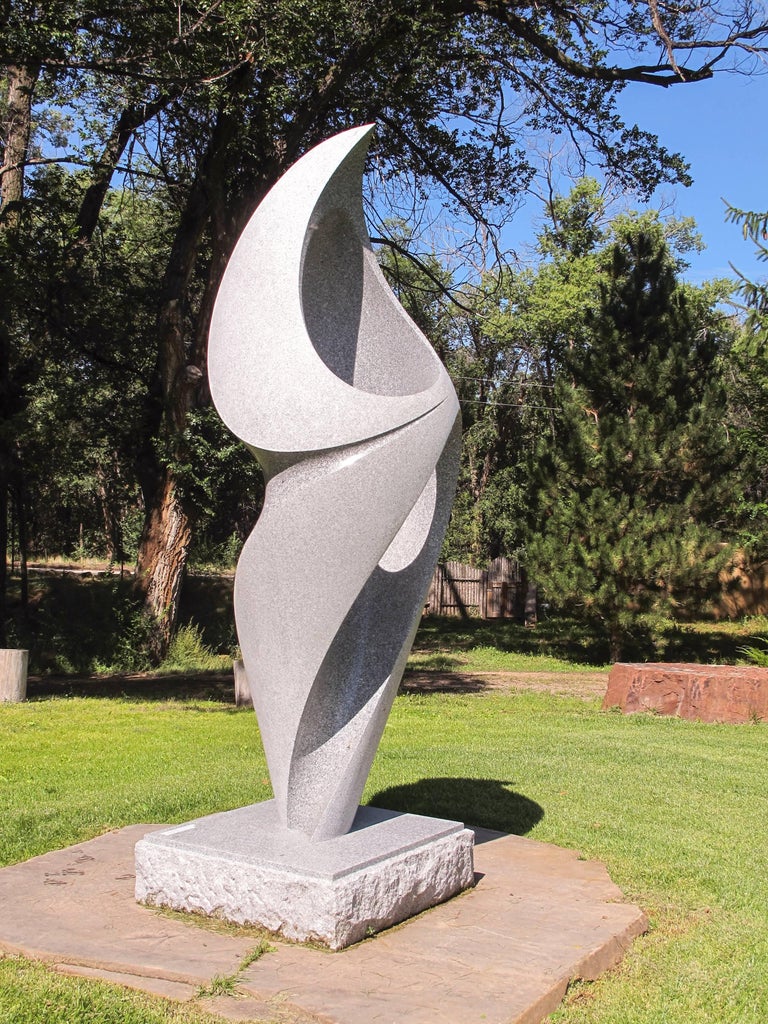 Khang PhamNew Infinity, polished red granite sculpture, monumental