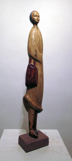 Organic Shopper, Troy Williams wood sculpture, female with grocery bag, Santa Fe