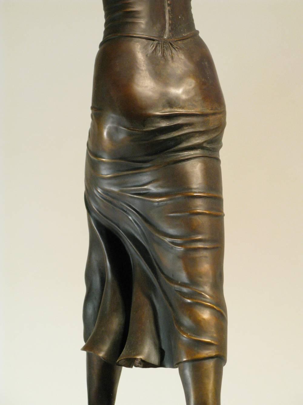Truckin', by Rodger Jacobsen, female figure, bronze sculpture, steel base For Sale 1
