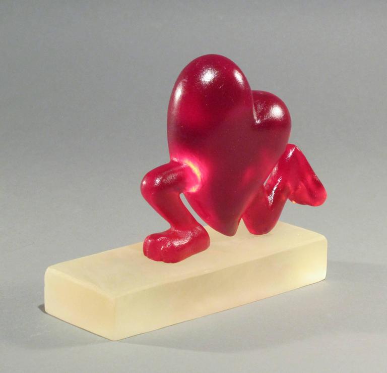 Running Heart, red, resin - Sculpture by Glenn A. Green