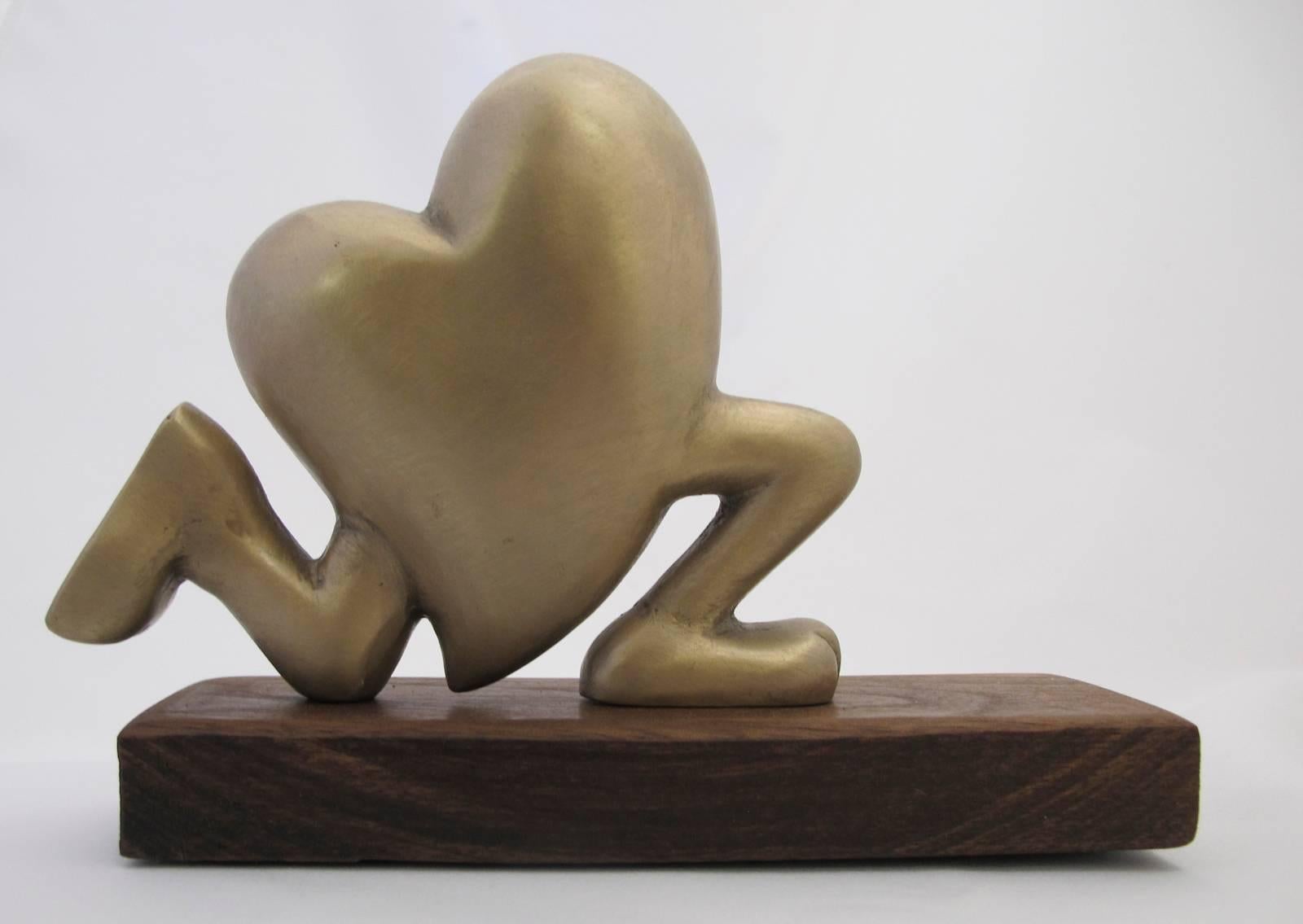 Running Heart, gold, bronze, sculpture Valentine heart shoes cartoon humor love