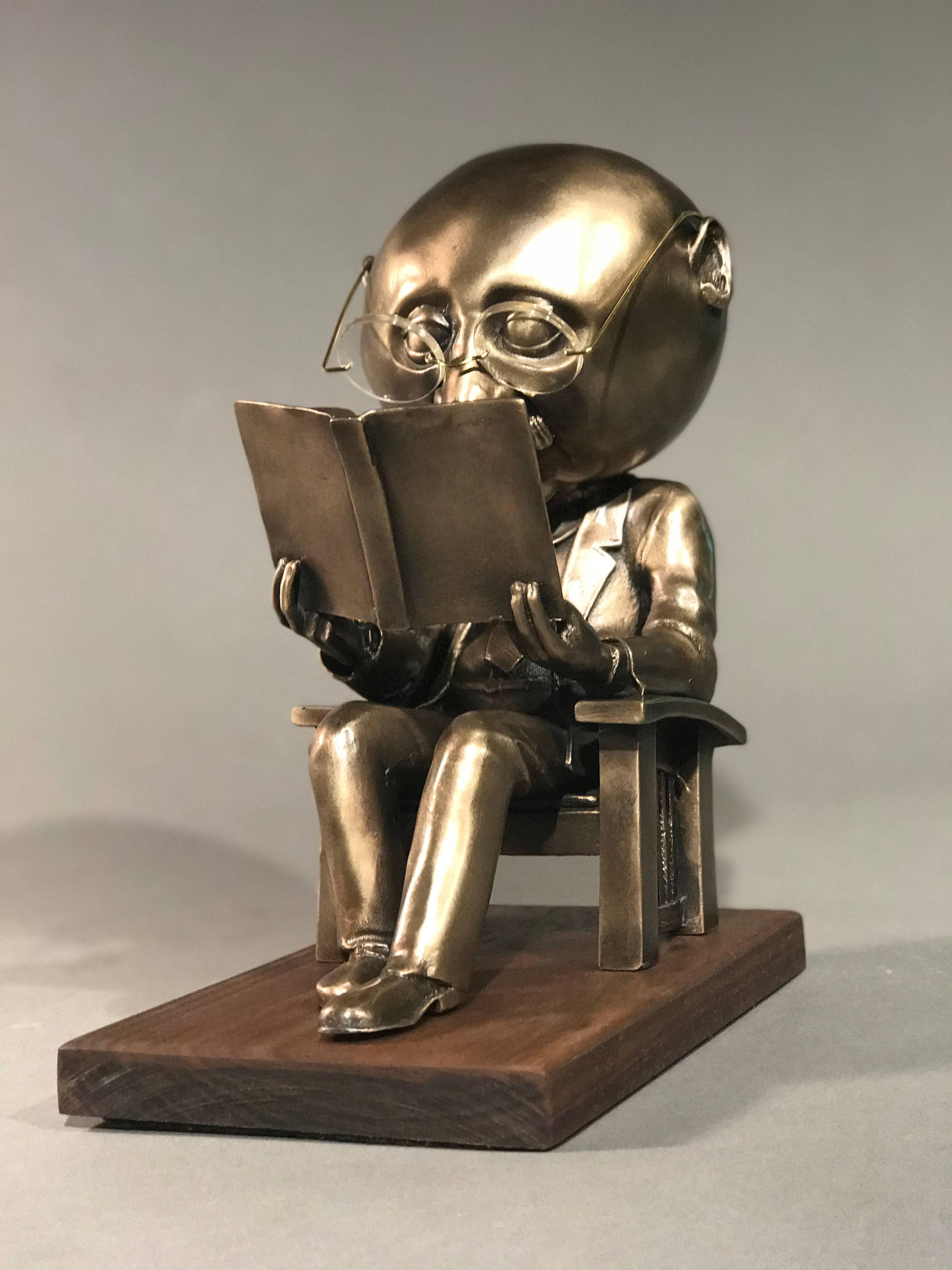 The Reader (small), gold bronze sculpture, reading book, glasses, Rodger Jacobsen 3