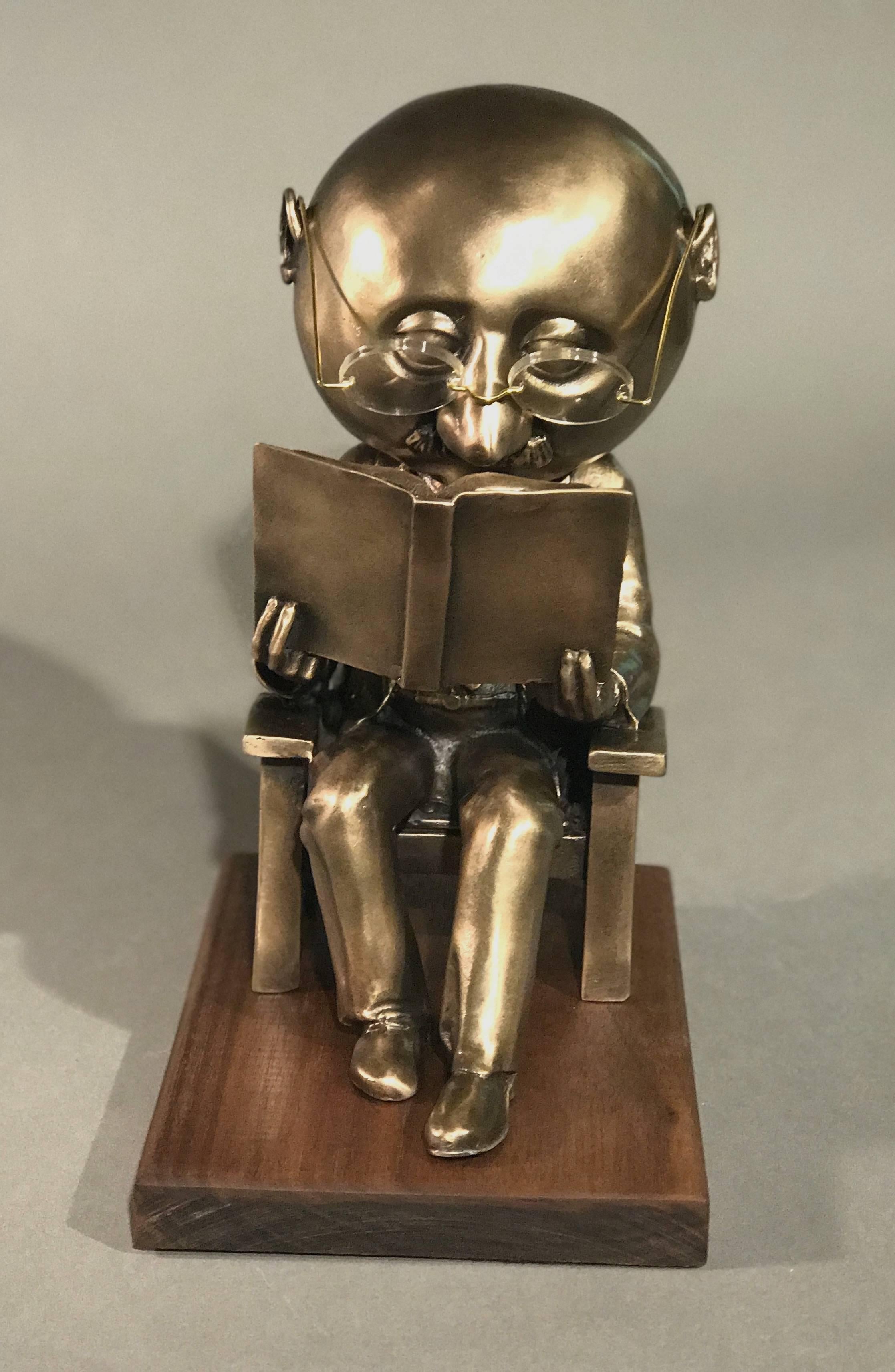 The Reader (small), gold bronze sculpture, reading book, glasses, Rodger Jacobsen 5