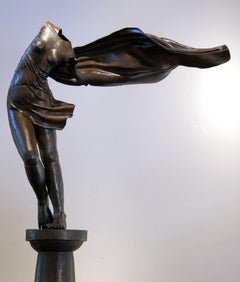 Long Gone by Rodger Jacobsen female nude bronze sculpture, stone base, contempor