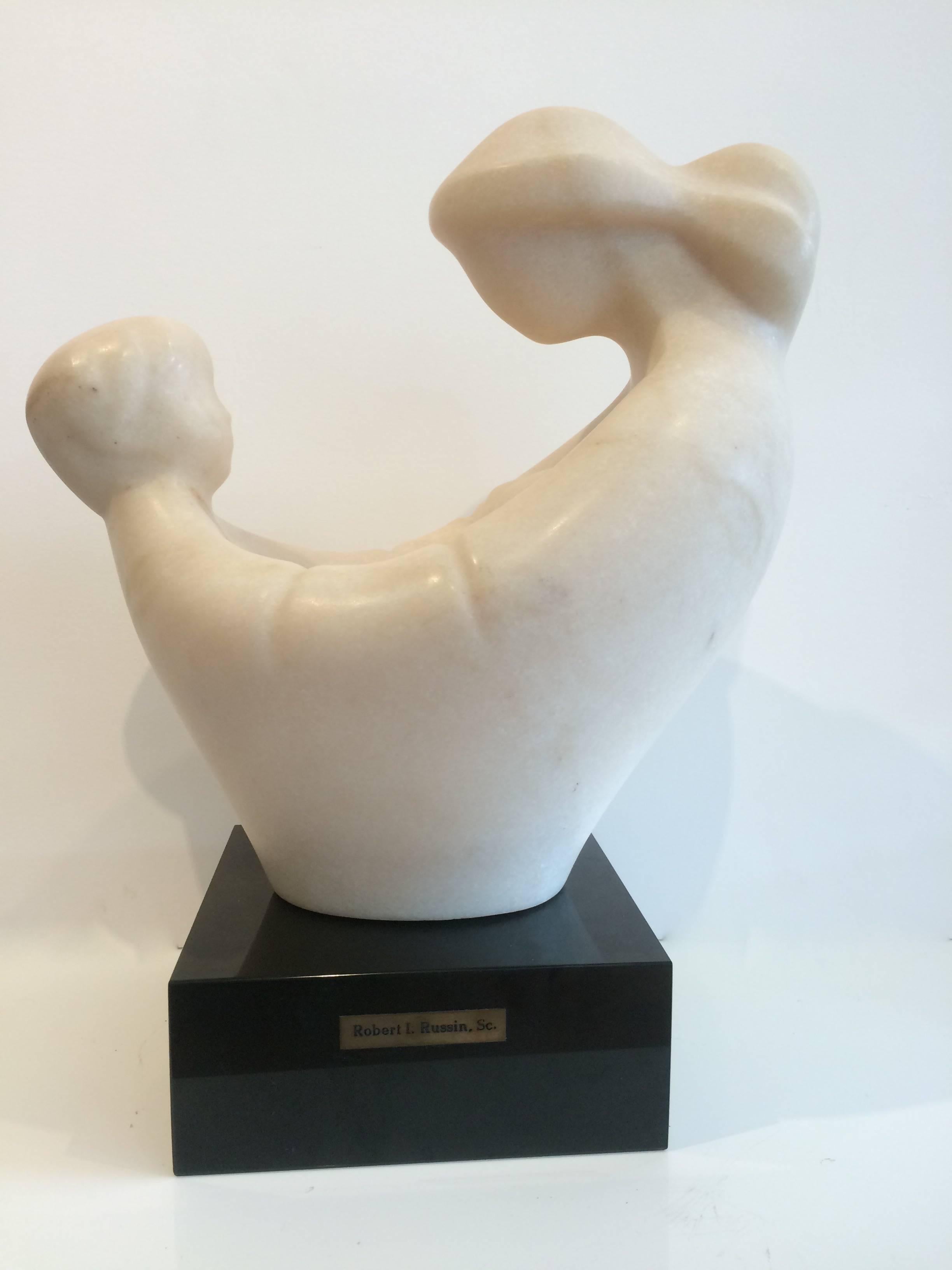 Mother with child.
Soft pink-white marble, black onyx pedestal, artist signed.
It will be shipped in two separate boxes.
Robert Russin, born in 1914, in New York City died in 2007, well recognized American Artist.
Russin was educated at the City