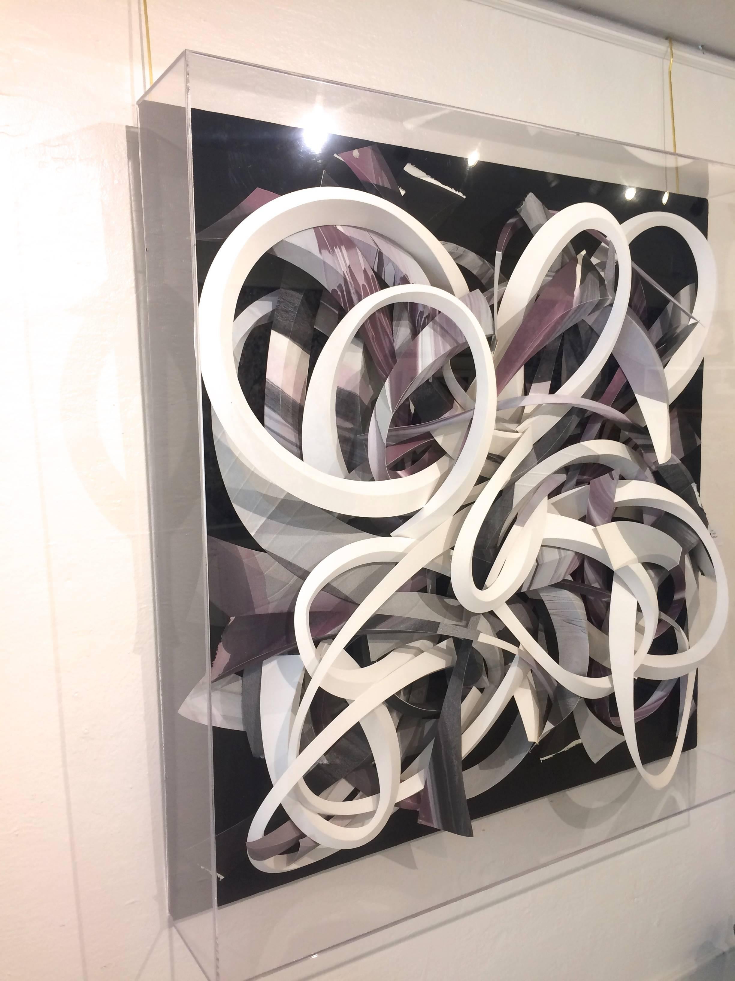 Size: 48x48x8.5 framed Under Plexiglass box

Stunning 3D abstracts, wall sculpture by Pasadena abstract expressionist artist Don Bowman born 1934. Floating waves of paper make a fluid statement on a black background neutral cream palette with pops