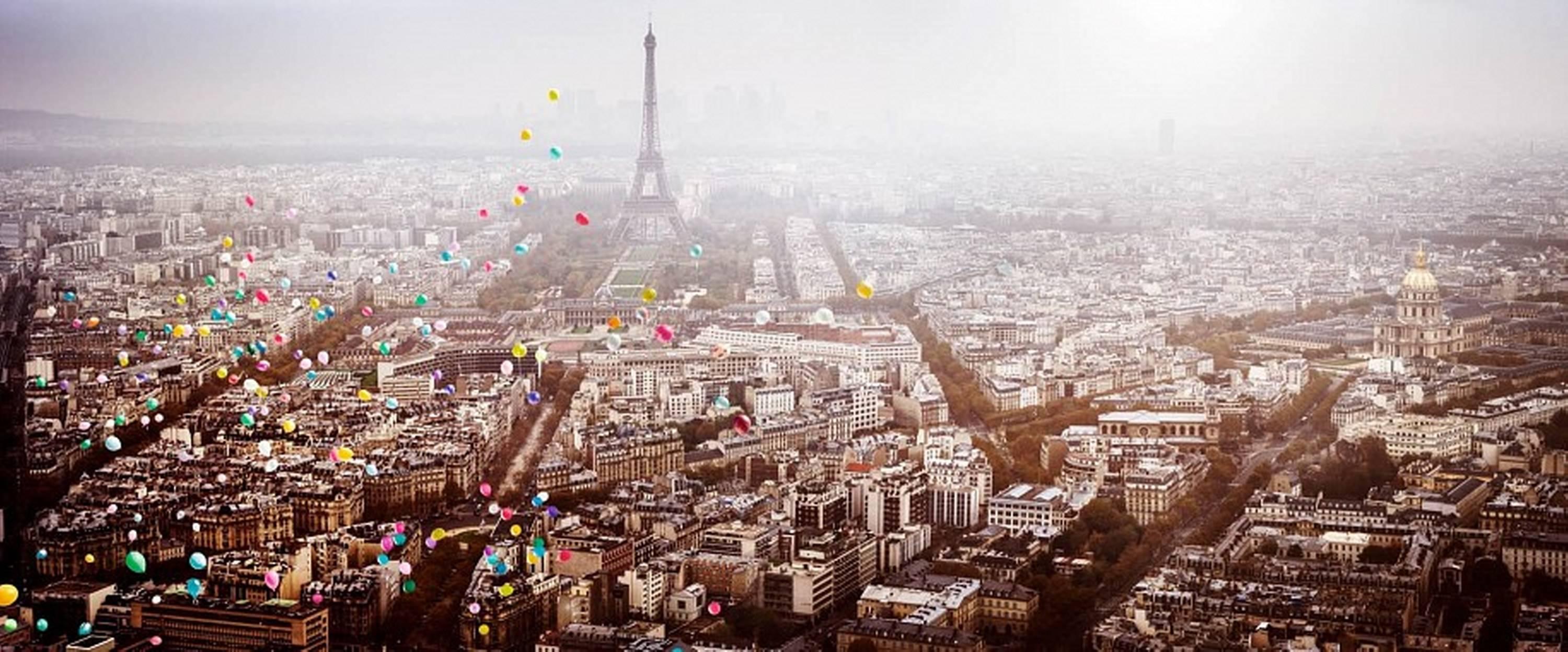 Balloons over Paris (France) - aerial view of Paris with Eiffel Tower balloons 