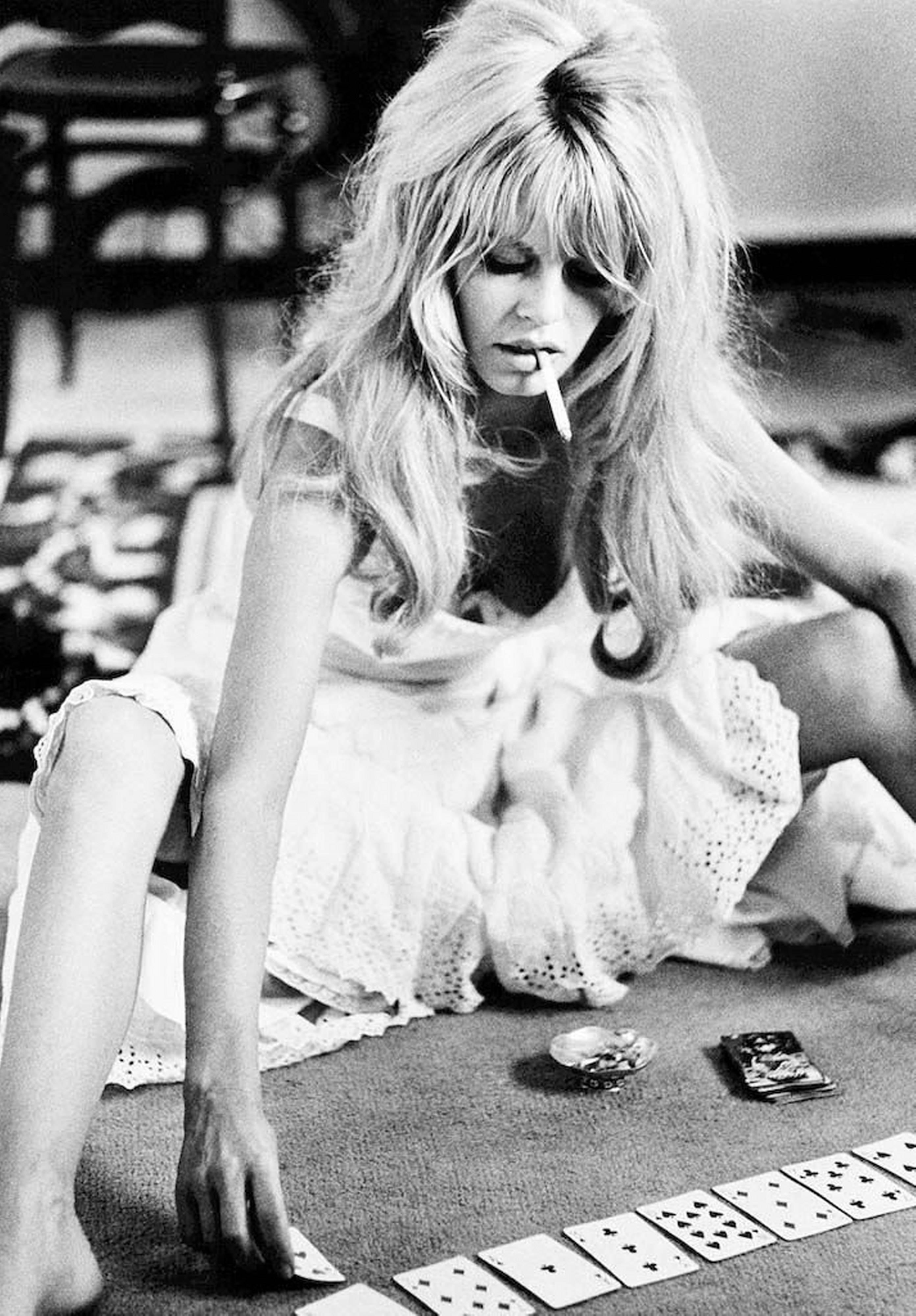 Douglas Kirkland Black and White Photograph - Brigitte Bardot playing cards
